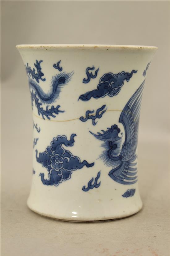 A Chinese blue and white waisted brush pot, Jiajing mark, Kangxi period, 13cm., broken and re-stuck